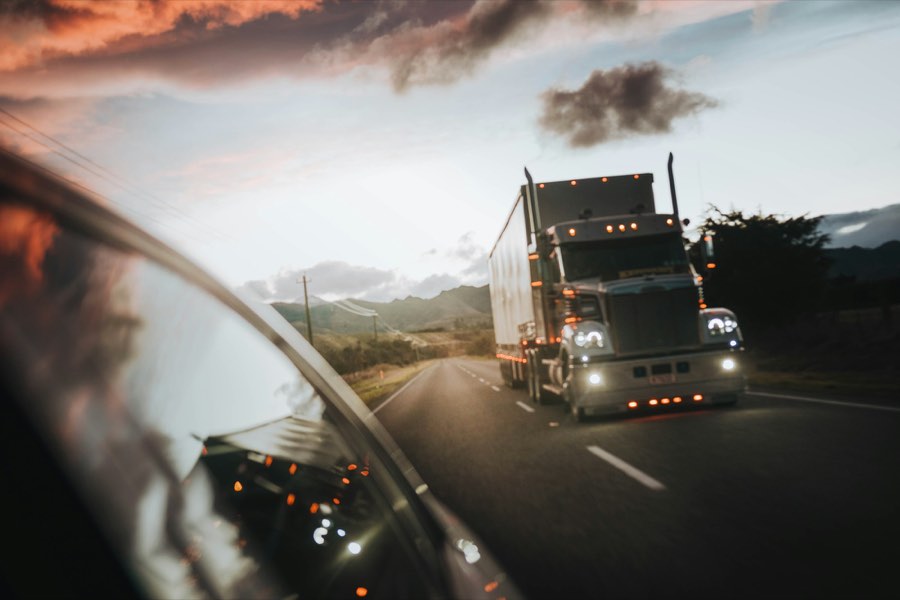 Semi truck on a highway at dusk